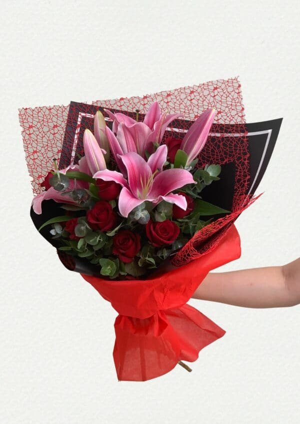lily and red roses arrangement