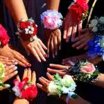 corsage flowers on girls hands