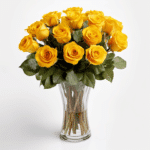 bunch of yellow roses in a glass vase by flower club
